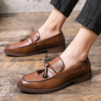 Mocasines de cuero con borlas