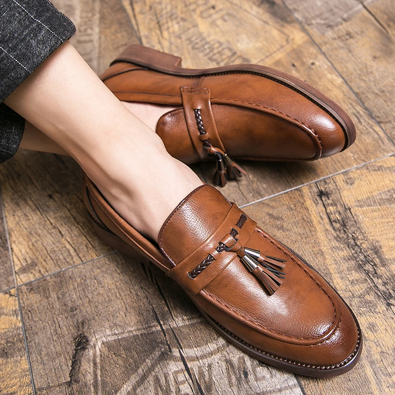 Mocasines de cuero con borlas