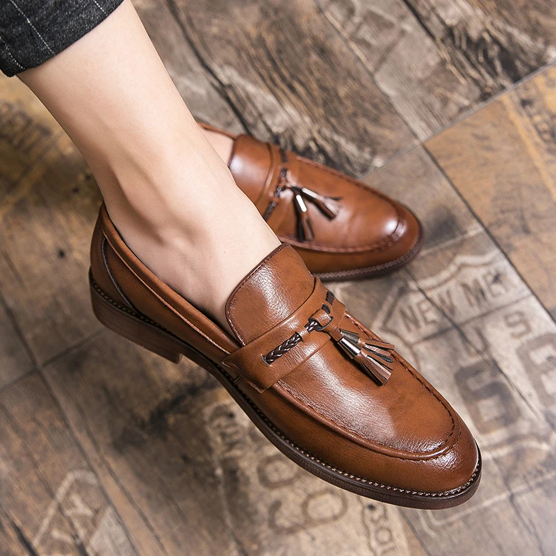 Mocasines de cuero con borlas