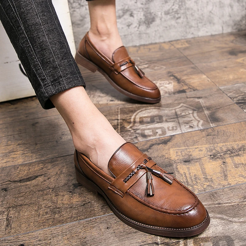 Mocasines de cuero con borlas