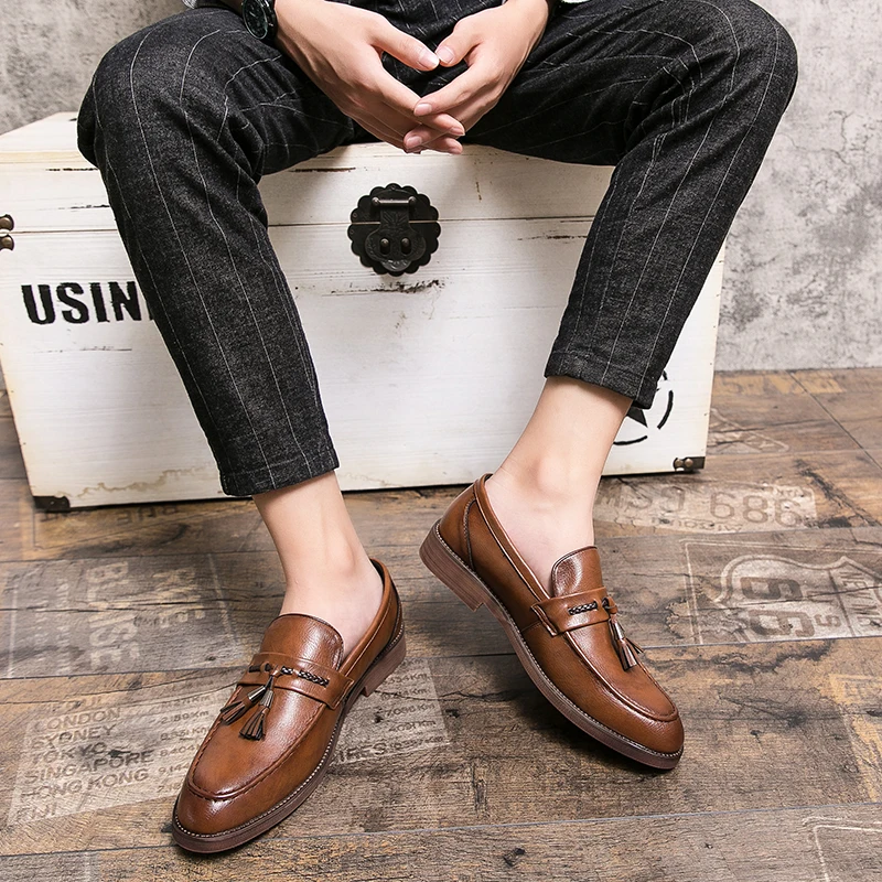 Mocasines de cuero con borlas