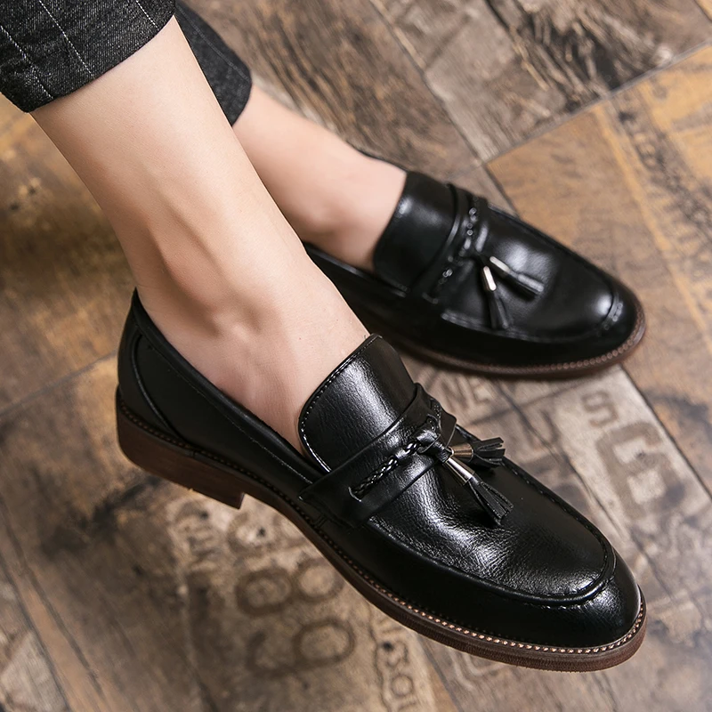 Mocasines de cuero con borlas