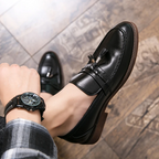 Mocasines de cuero con borlas
