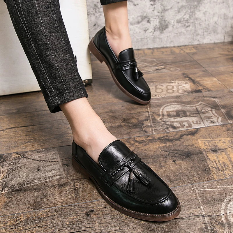 Mocasines de cuero con borlas