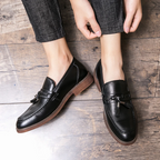 Mocasines de cuero con borlas