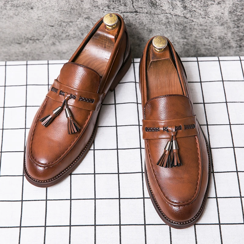 Mocasines de cuero con borlas