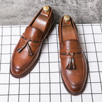 Mocasines de cuero con borlas