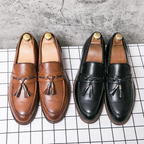 Mocasines de cuero con borlas