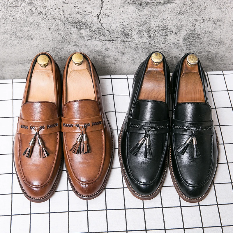 Mocasines de cuero con borlas