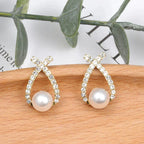 Pendientes con perlas y purpurina