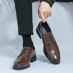 Zapatos elegantes de cuero de lujo
