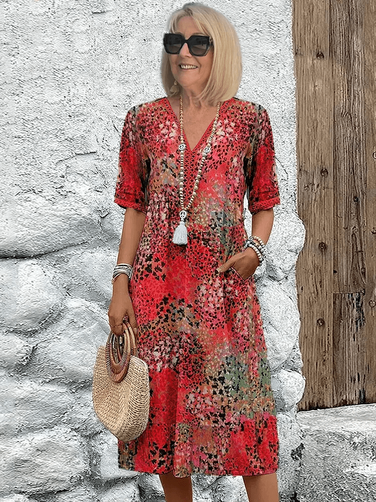 Elaisa | Elegantna Cvečna Midi Obleka