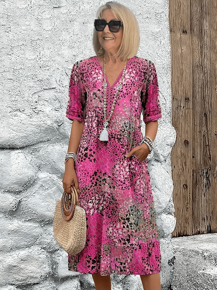 Elaisa | Elegantna Cvečna Midi Obleka