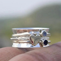 Anillo Rotativo de Corazón Elegante en Plata